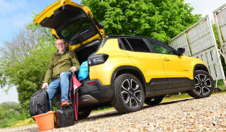 Auto Express editor-at-large John McIlroy sitting in the Jeep Avenger's boot